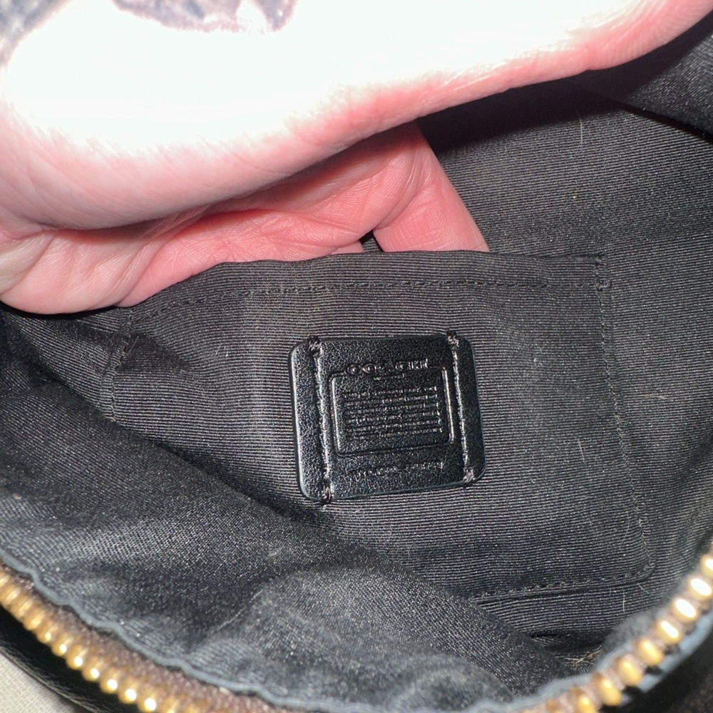 Chic Black Handbag with Gold Accents